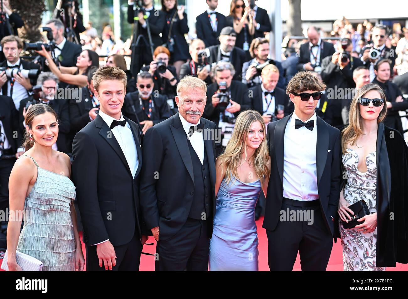 Cannes, France. 19th May, 2024. Lily Costner, Hayes Logan Costner, Grace Avery Costner, Kevin Costner, Cayden Wyatt Costner, and Annie Costner are attending the ''Horizon: An American Saga'' Red Carpet at the 77th annual Cannes Film Festival at Palais des Festivals in Cannes, France, on May 19, 2024. (Photo by Stefanos Kyriazis/NurPhoto) Credit: NurPhoto SRL/Alamy Live News Stock Photo