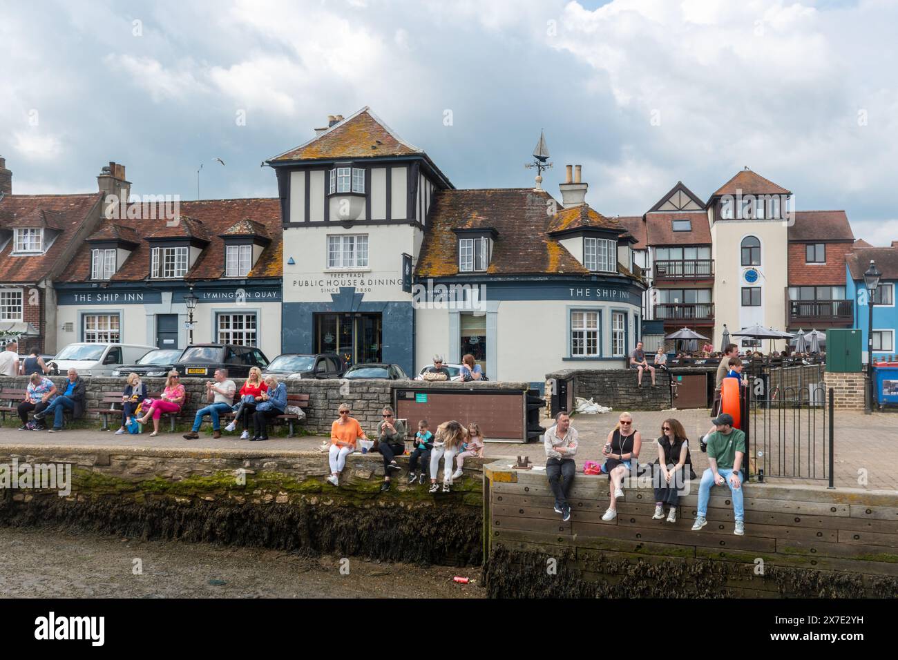 Lymington Harbour (Town Quay) with people relaxing on a warm Saturday in May, Hampshire, England, UK Stock Photo