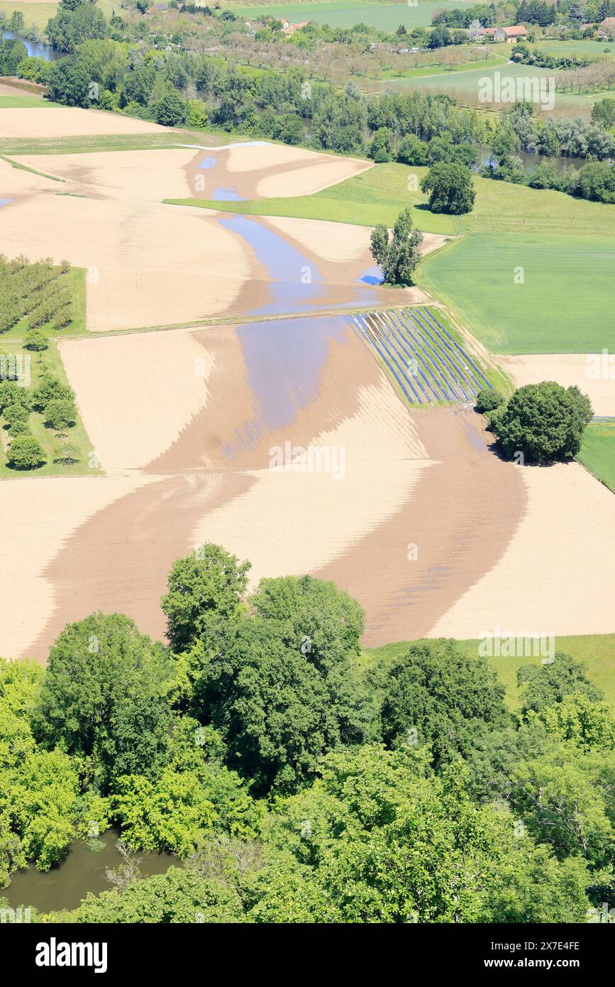 The Dordogne River flows through agricultural land in Périgord Noir in