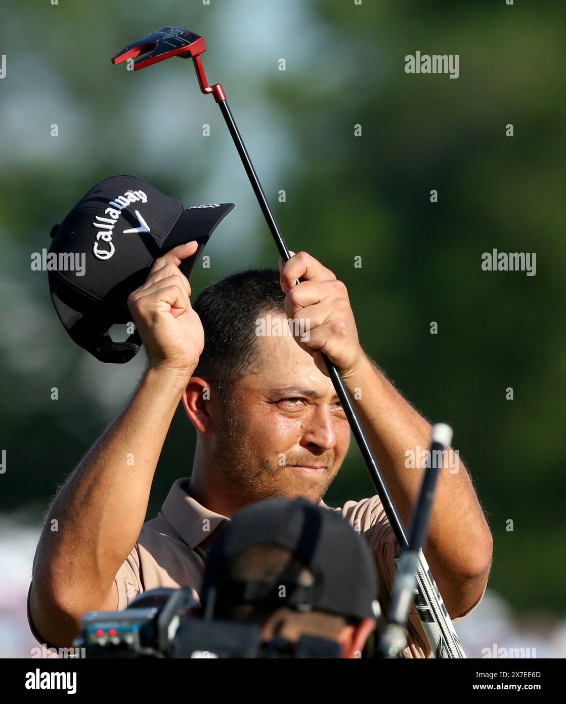 Xander Schauffele celebrates after sinking a birdie putt on the Xander Schauffele celebrates after sinking a birdie putt on the