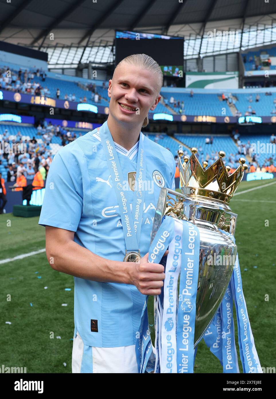 Manchester, UK. 20th May, 2024. Erling Haaland of Manchester City celebrates with the Premier League trophy after the English Premier League football match between Manchester City and West Ham United in Manchester, Britain, on May 19, 2024. Credit: Xinhua/Alamy Live News Stock Photo