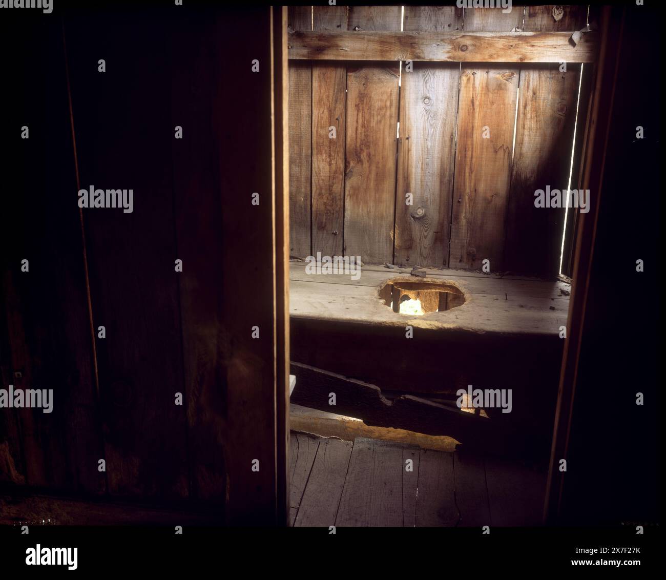 Old outhouse and water closet interior with pit toilet Stock Photo Alamy
