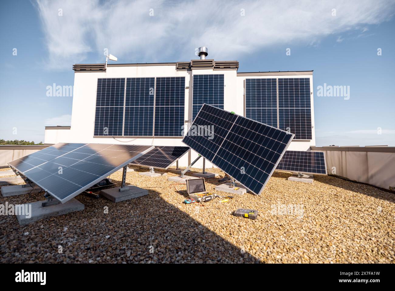 Technician installing solar panels alternative hi-res stock photography ...