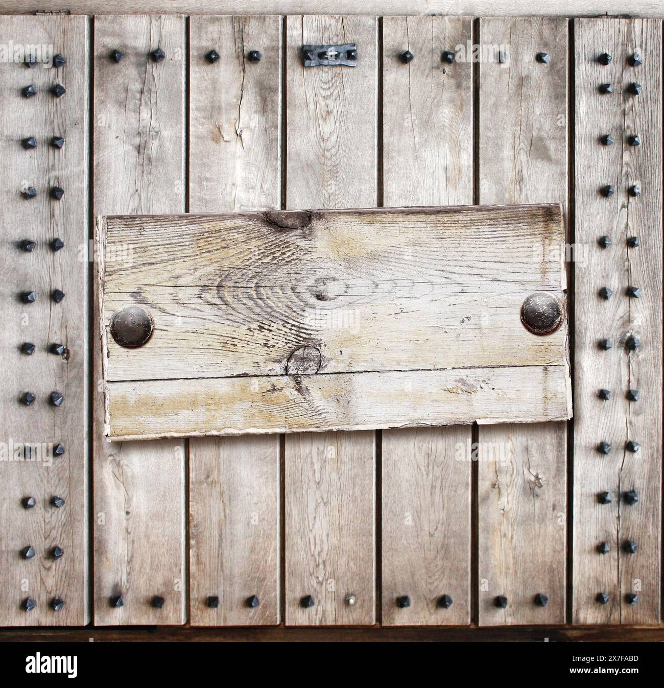 Decorative square background with old board, metal rivets and vintage ...