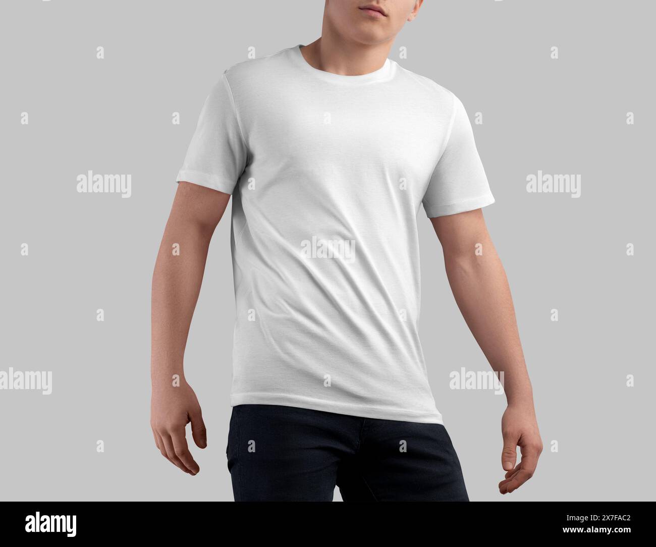 White t-shirt mockup on athletic guy in black jeans, summer crew neck shirt for design, pattern, branding, front view. Template of stylish casual clot Stock Photo