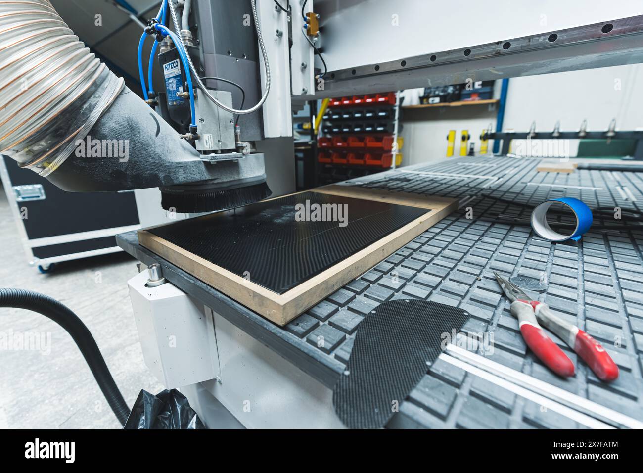 fiber cutting process at the factory, industrial machine working. High ...