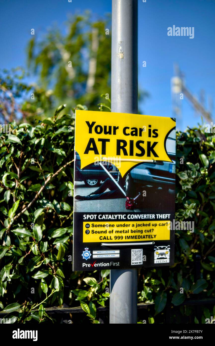 Spot Catalytic Converter Theft sign, Carpenders Park, Hertfordshire, England, UK Stock Photo