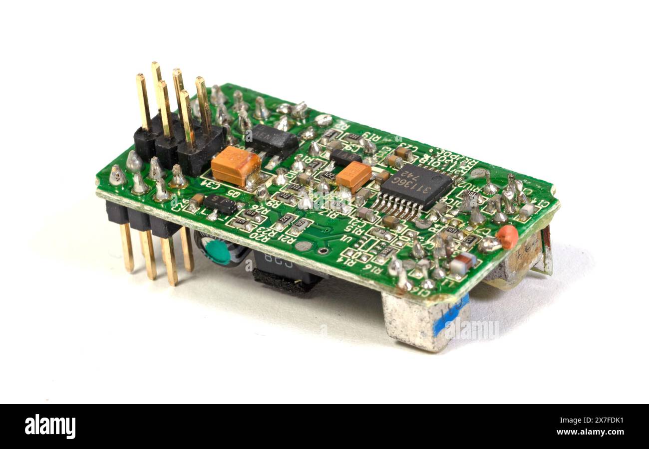 Small computer processing unit system on micro chip printed circuit board(PCB) at finger size, isolated Stock Photo