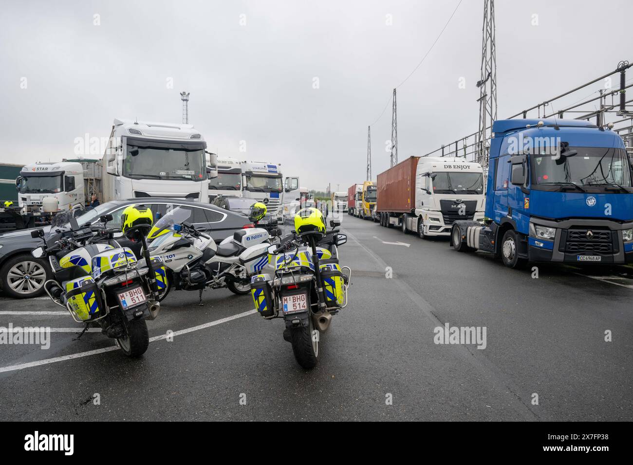 Antwerp, Belgium. 20th May, 2024. Police motorcycles are seen as the Antwerp Police Zone, the Federal Police, the Social Intelligence and Investigation Service SIOD and the European Labor Authority ELA are organizing a large-scale heavy transport inspection action under the leadership of the labor auditor, with a focus on the employment conditions of truck drivers, in Antwerp, Monday 20 May 2024. BELGA PHOTO JONAS ROOSENS Credit: Belga News Agency/Alamy Live News Stock Photo