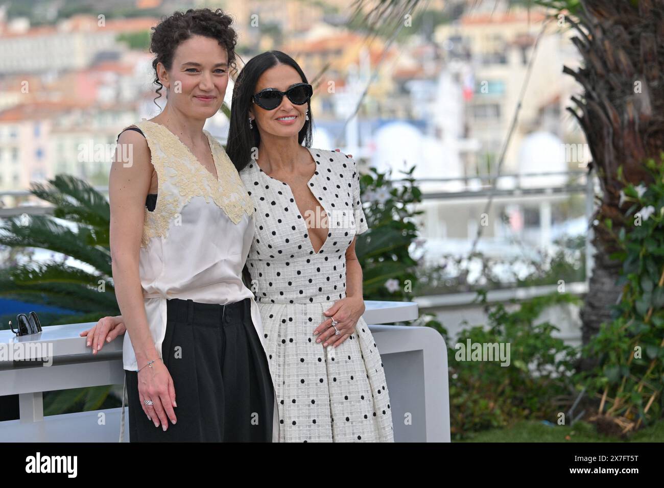Coralie Fargeat, Demi Moore attending a photocall for the movie The