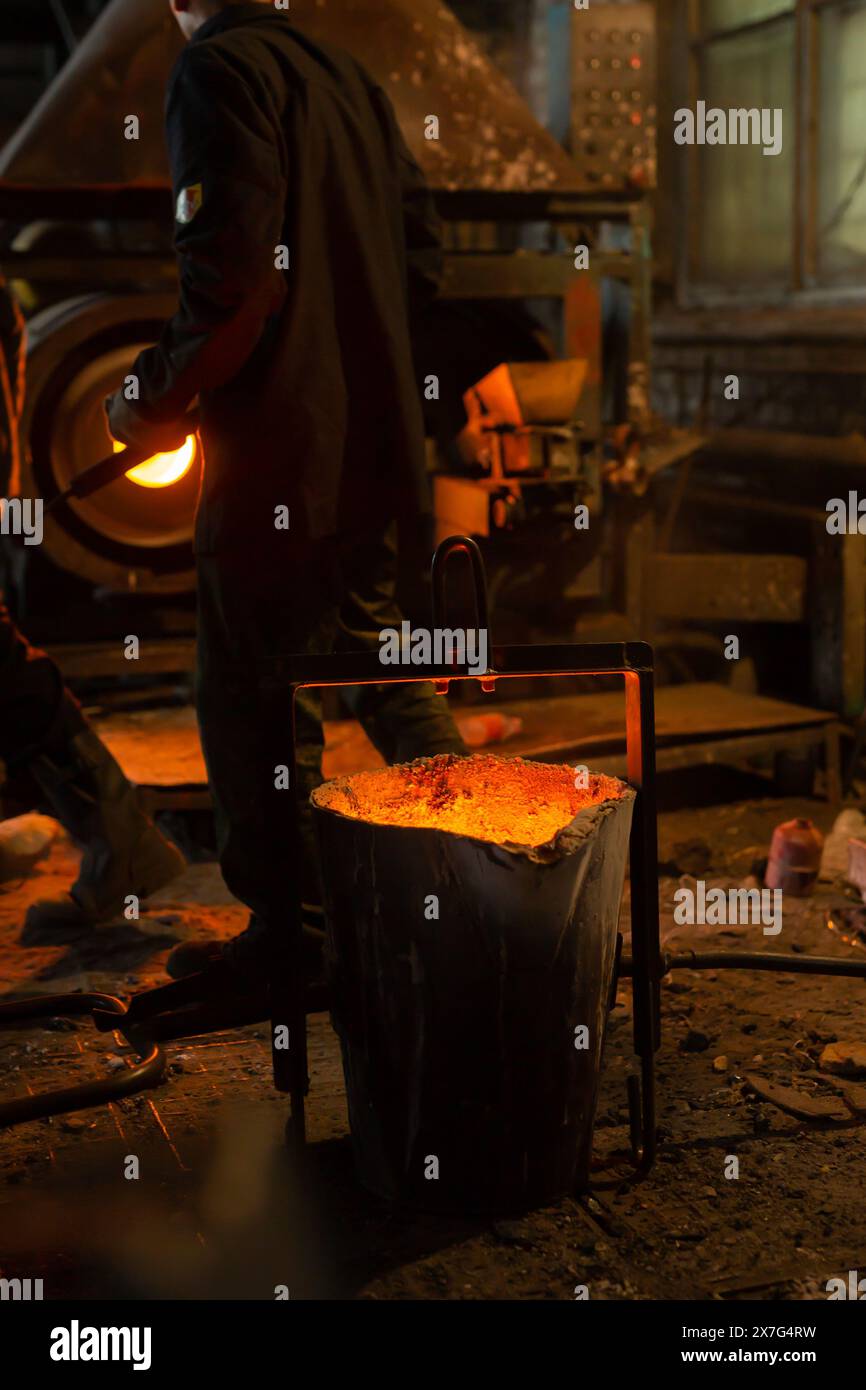 Foundry ladle with molten metal in workshop of metallurgical plant Stock Photo