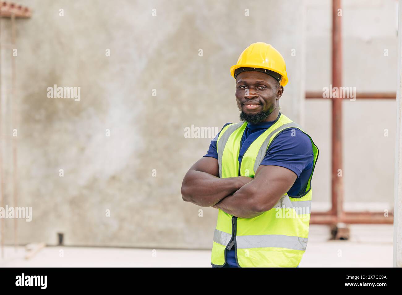 Portrait happy smiling African black smart engineer worker foreman supervisor working outdoor in Precast concrete casting industry Stock Photo