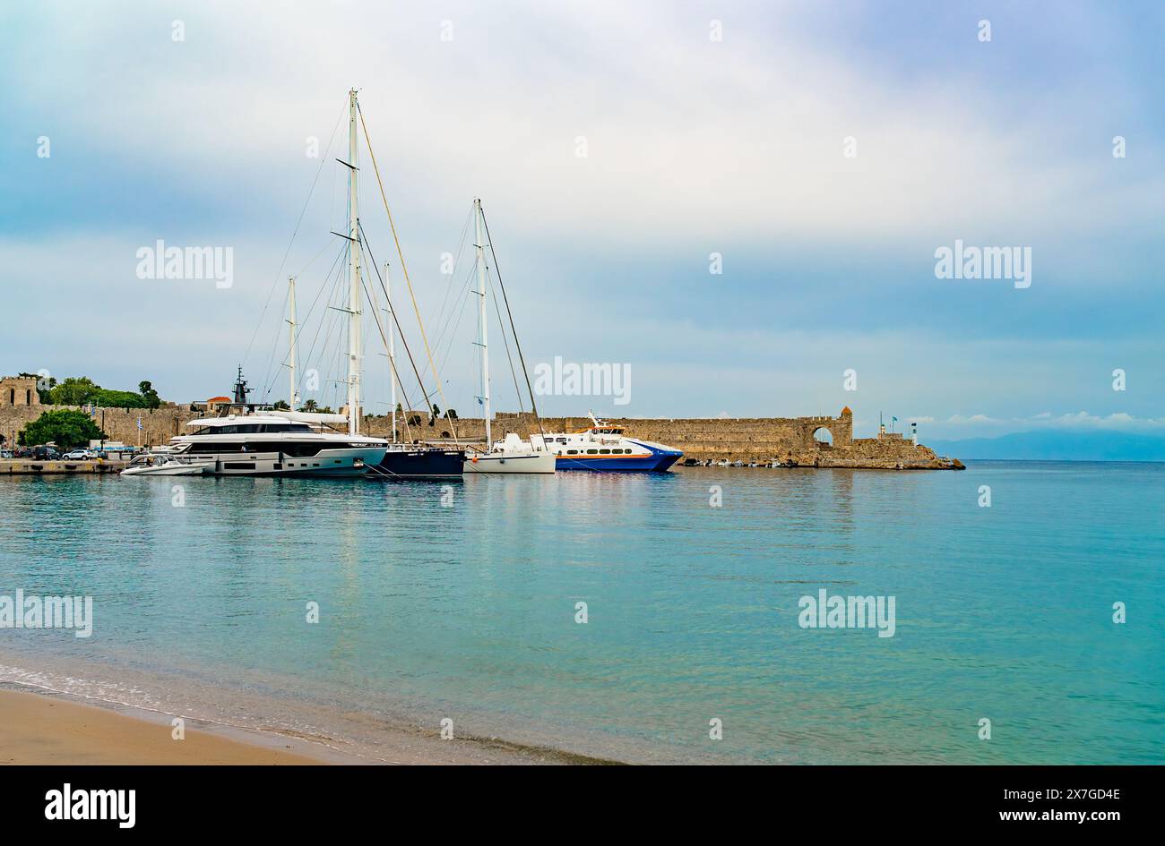 Pretty Rhodes Kolona Harbor in the city of Rhodes on the island of Rhodes Stock Photo ...