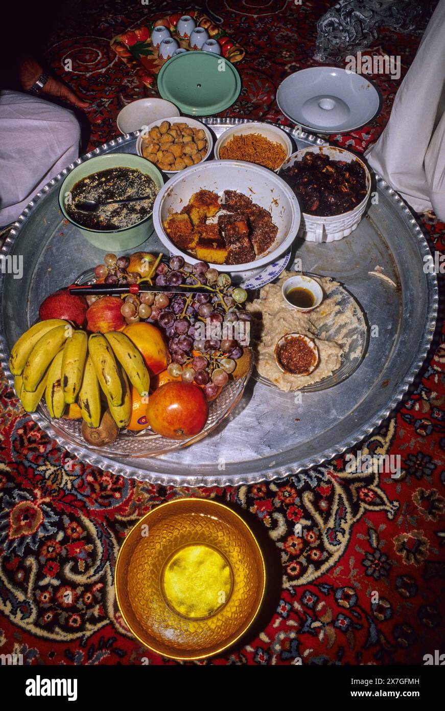 Mudayrib, Oman, Arabian Peninsula, Middle East - Lunch on the Eid al-Adha (Feast of the Sacrifice), the annual feast through which Muslims commemorate Stock Photo