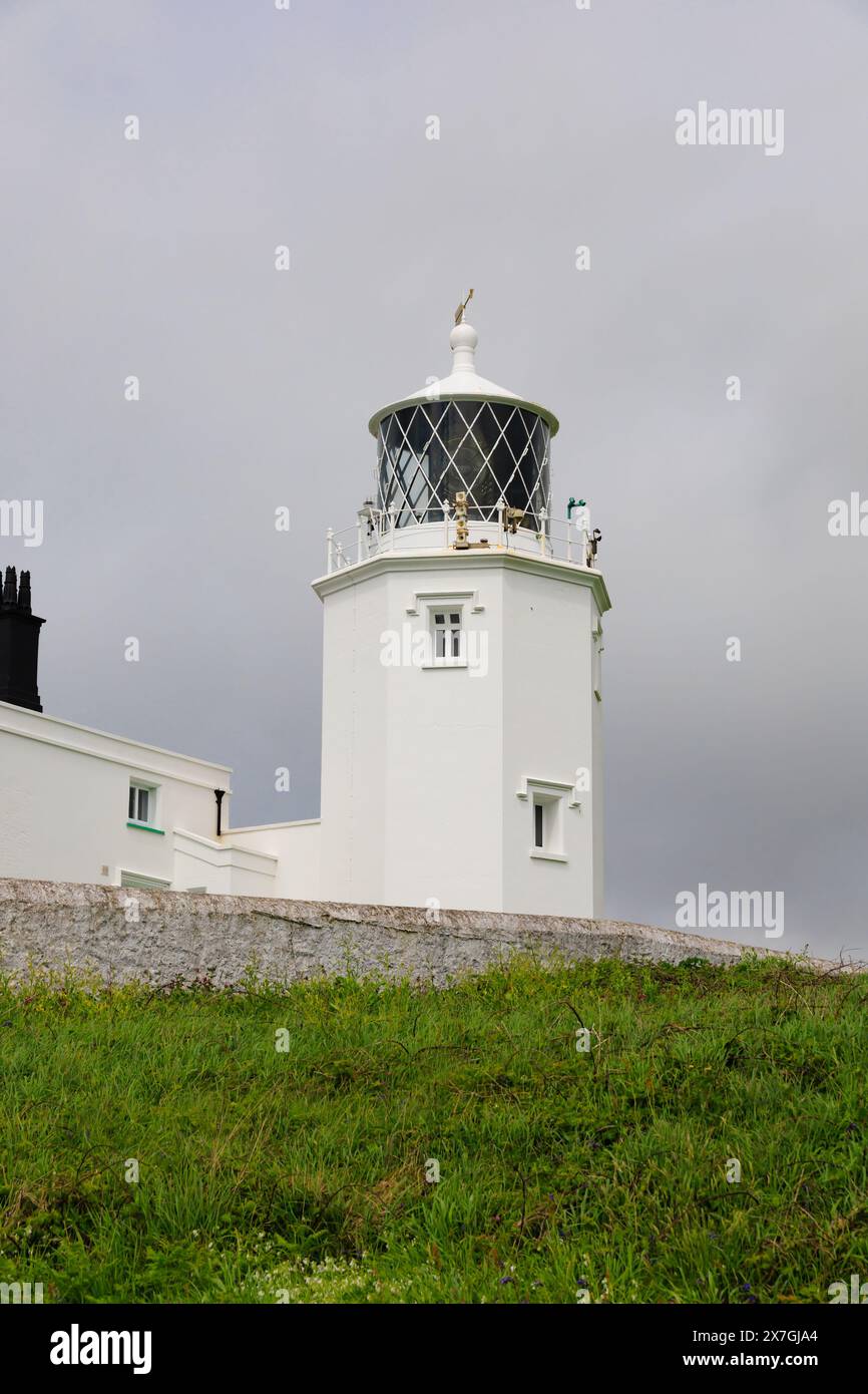 The Lizard Point lighthouse with grey sky, Cornwall, West Country, England Stock Photo