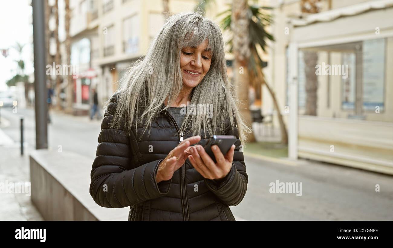 Lively mature woman using hi-res stock photography and images - Alamy
