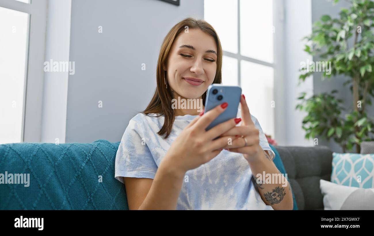 Seated comfortably home young hi-res stock photography and images - Alamy