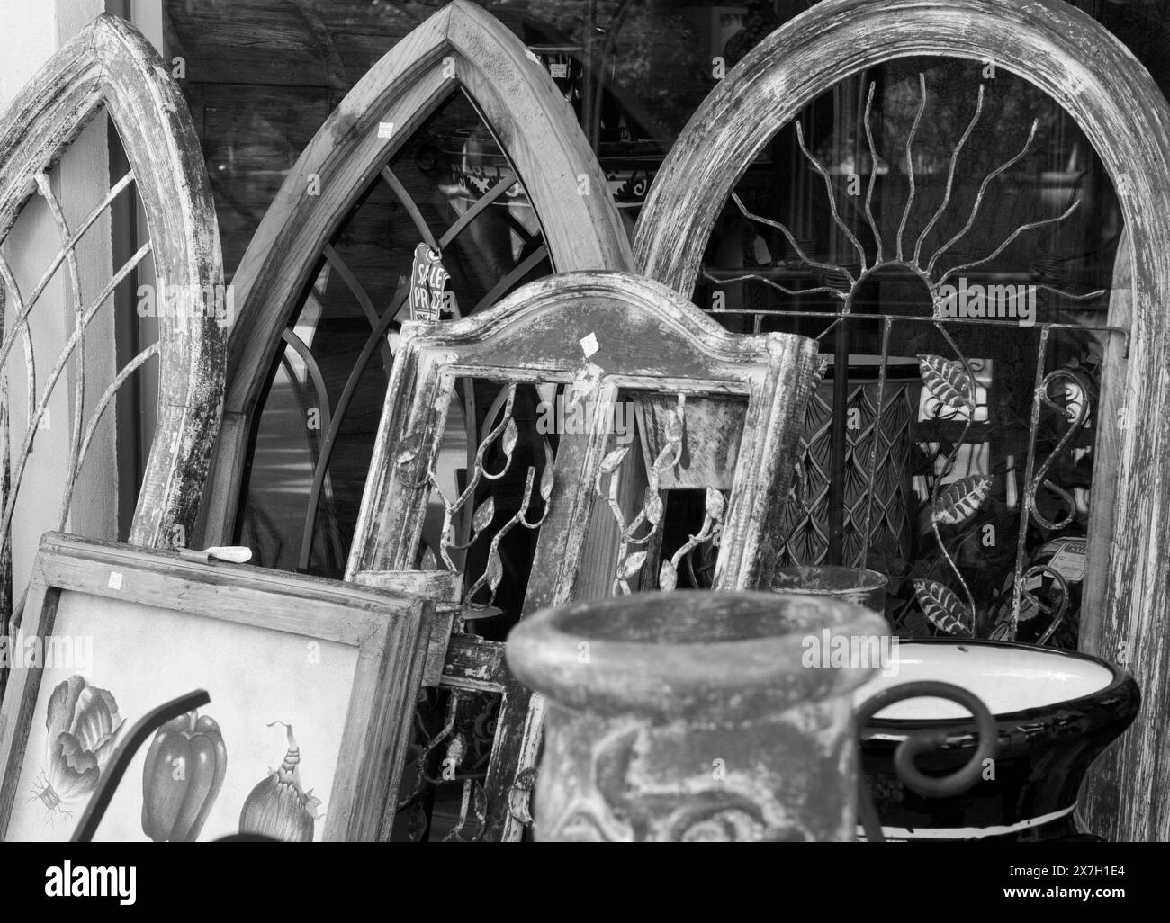 Timeless Treasures: Antique church windows, vases, and other unique items on display in the historic streets of St. Augustine, Florida, USA.. Stock Photo