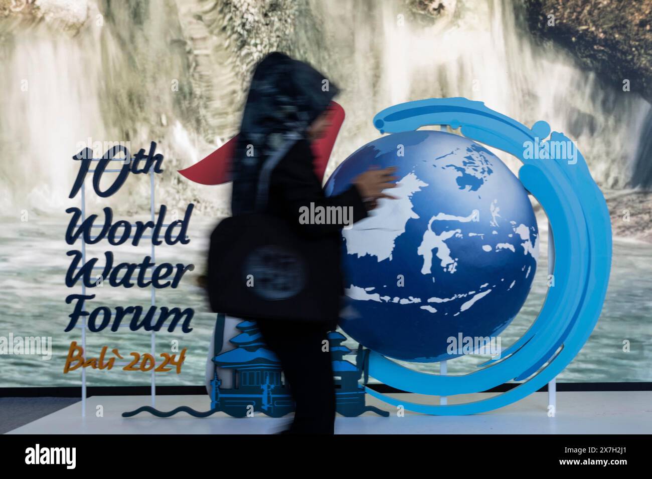 Bali, Indonesia. 20th May, 2024. A visitor is seen at the Fair and Expo of the 10th World Water Forum in Bali, Indonesia, May 20, 2024. The 10th World Water Forum under the theme of 'Water for Shared Prosperity' officially opened on Indonesia's island of Bali on Monday. The 10th World Water Forum focused on four topics, namely water conservation, clean water and sanitation, food and energy security, and mitigation of natural disasters. Credit: Veri Sanovri/Xinhua/Alamy Live News Stock Photo