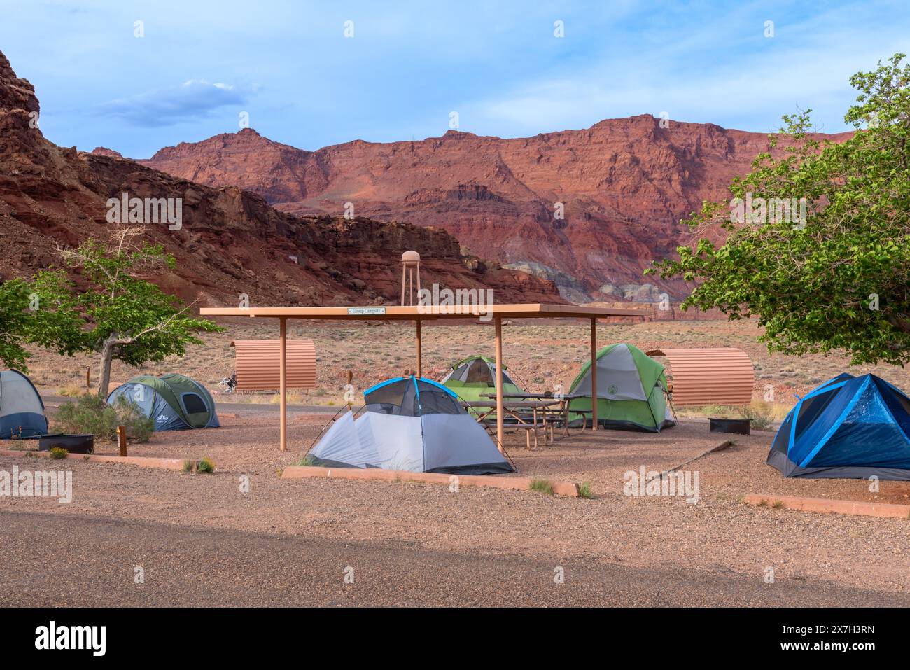 Group camping in small tents in Marble Canyon, Arizona, sheer purple