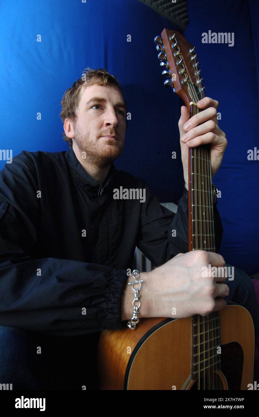 Owen Powell, former guitarist with Catatonia, who has undertaken a music management course, is pictured at The Pop Factory, in Porth, South Wales, where in partnership with a colleague he is completing a film score. Stock Photo