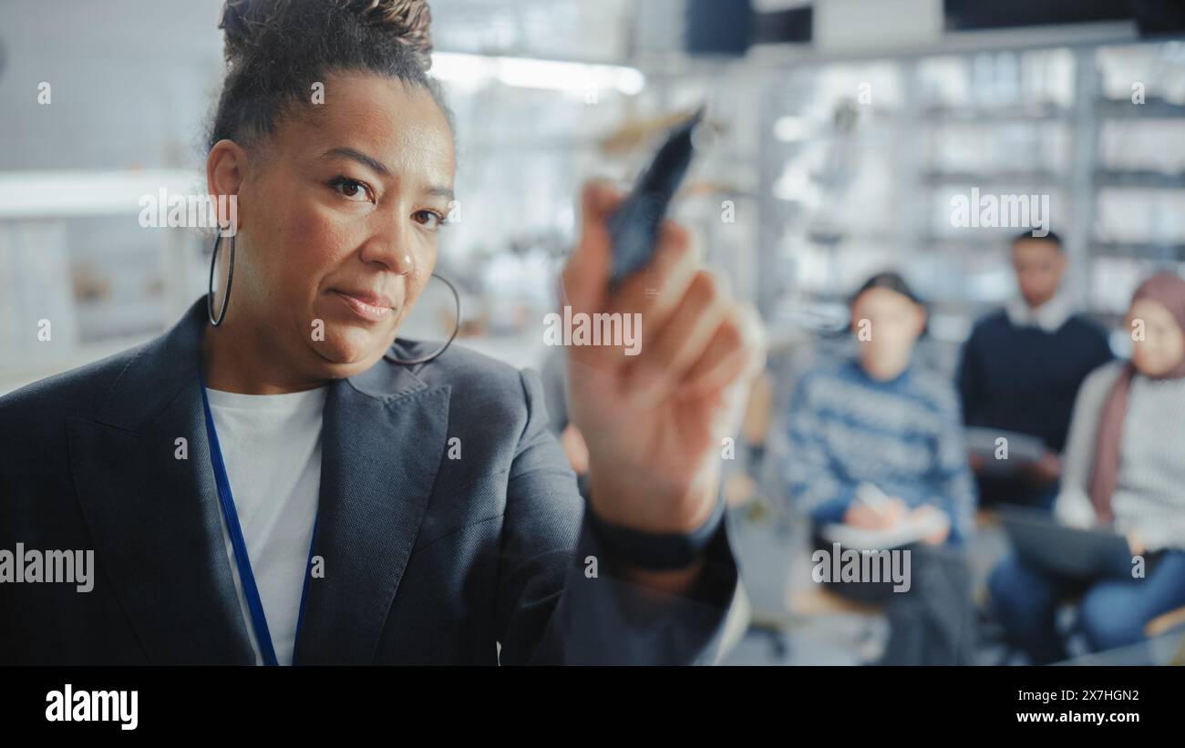 Female teacher solving mathematics hi-res stock photography and images ...