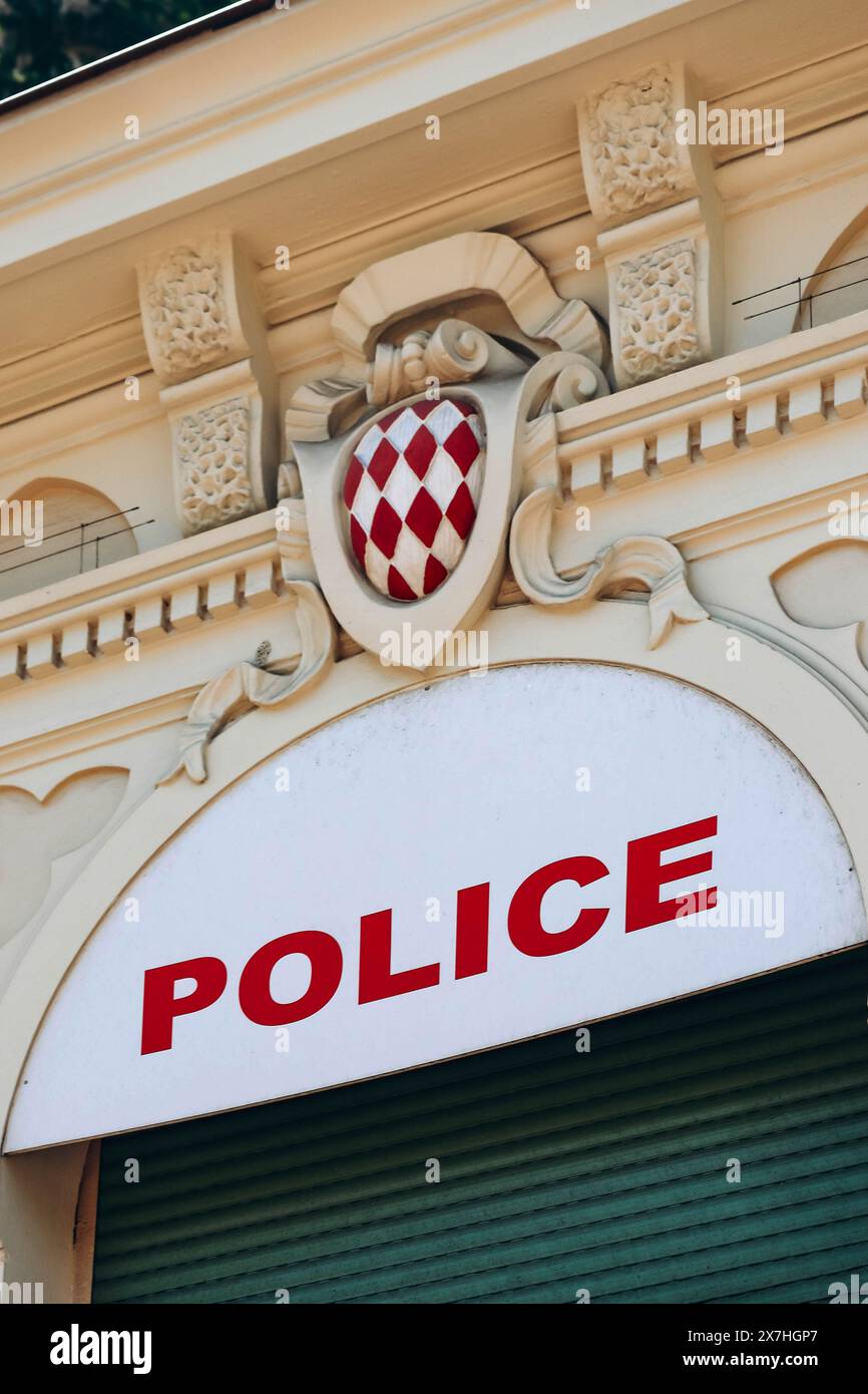 Monaco, Monaco - 25 June 2023: Sign of the police station in Monaco, with the coat of arms of the Principality Stock Photo