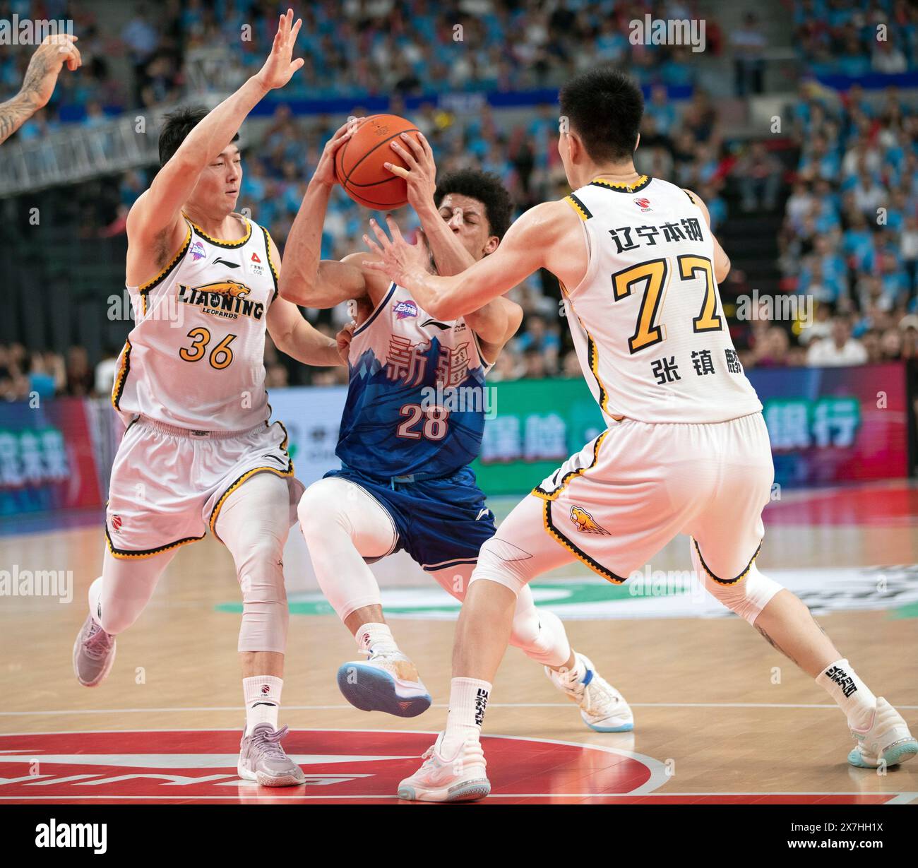 Urumqi, China's Xinjiang Uygur Autonomous Region. 20th May, 2024. Lindell Wigginton (C) of Xinjiang Flying Tigers competes during the play-off final third leg match between Xinjiang Flying Tigers and Liaoning Flying Leopards at the 2023-2024 season of the Chinese Basketball Association (CBA) league in Urumqi, northwest China's Xinjiang Uygur Autonomous Region, May 20, 2024. Credit: Luo Yuan/Xinhua/Alamy Live News Stock Photo