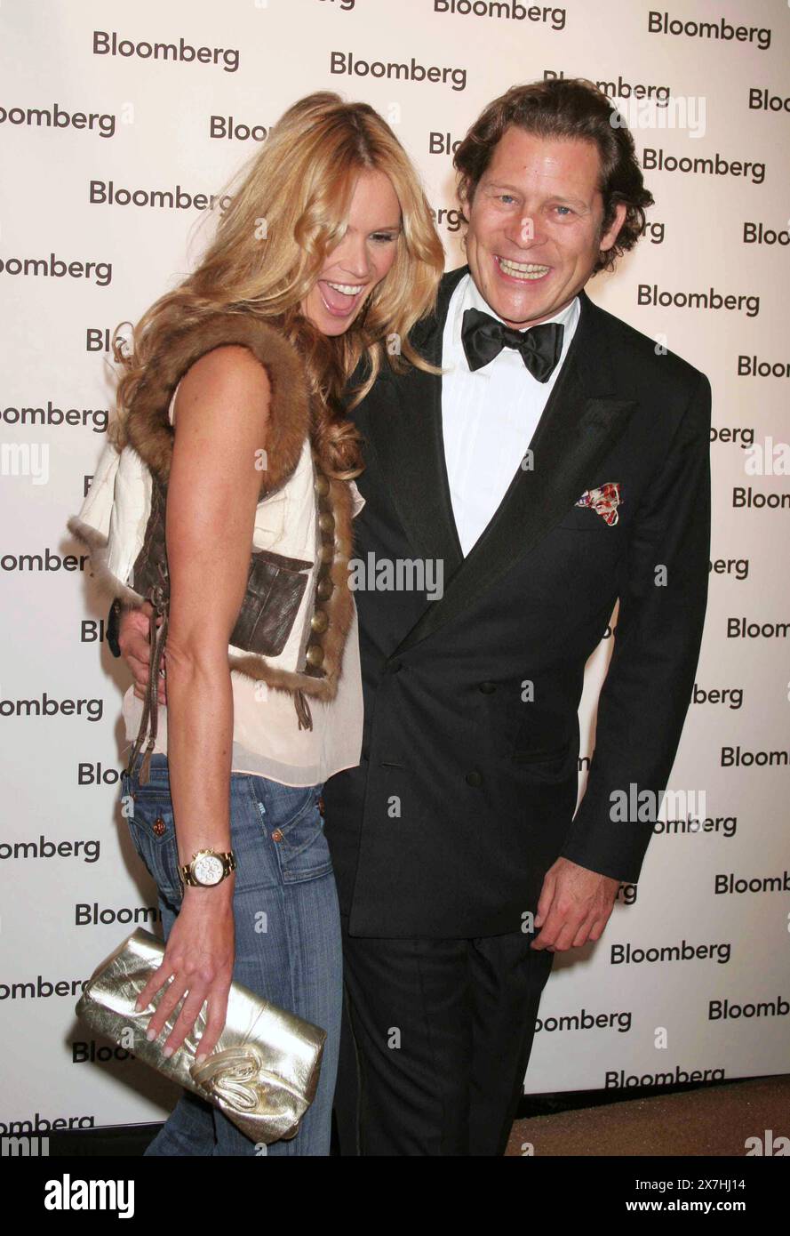 Elle Macpherson and Arpad Busson attend the Bloomberg News Party after the White House Correspondents' Dinner in Washington, DC on April 30, 2005.  Photo Credit: Henry McGee/MediaPunch Stock Photo