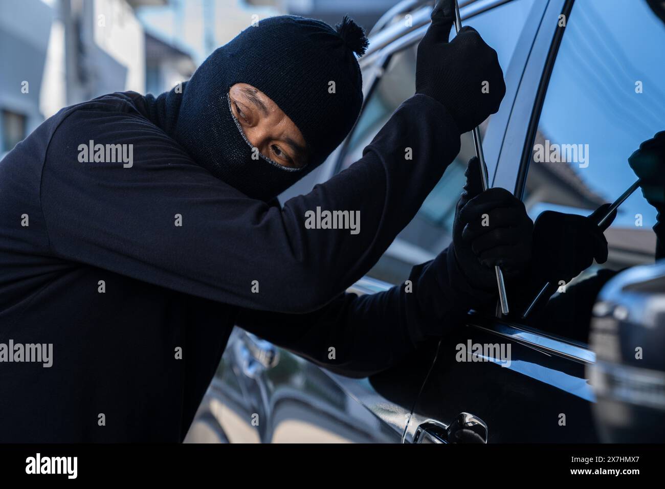 Thieves are stealing cars Stock Photo