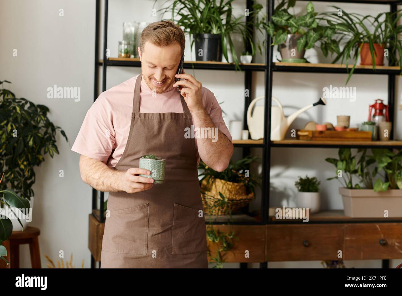 Pot Owner A charming man, owner of a plant shop, standing in his apron and ...