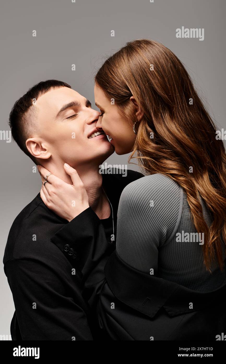 Woman kisses man cheek hi-res stock photography and images - Alamy