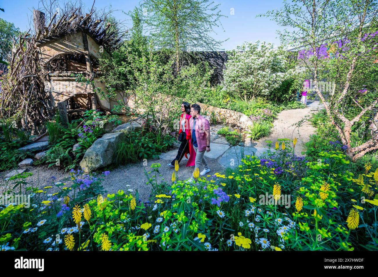 London, UK. 20th May, 2024. Adults walk through The RHS No Adults