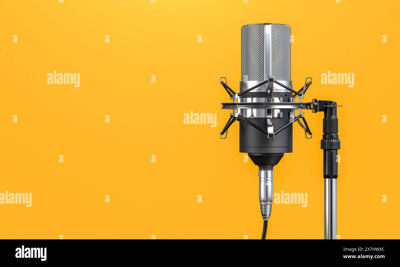 Microphone  yellow background, recording, studio, audio, copyspace Stock Photo