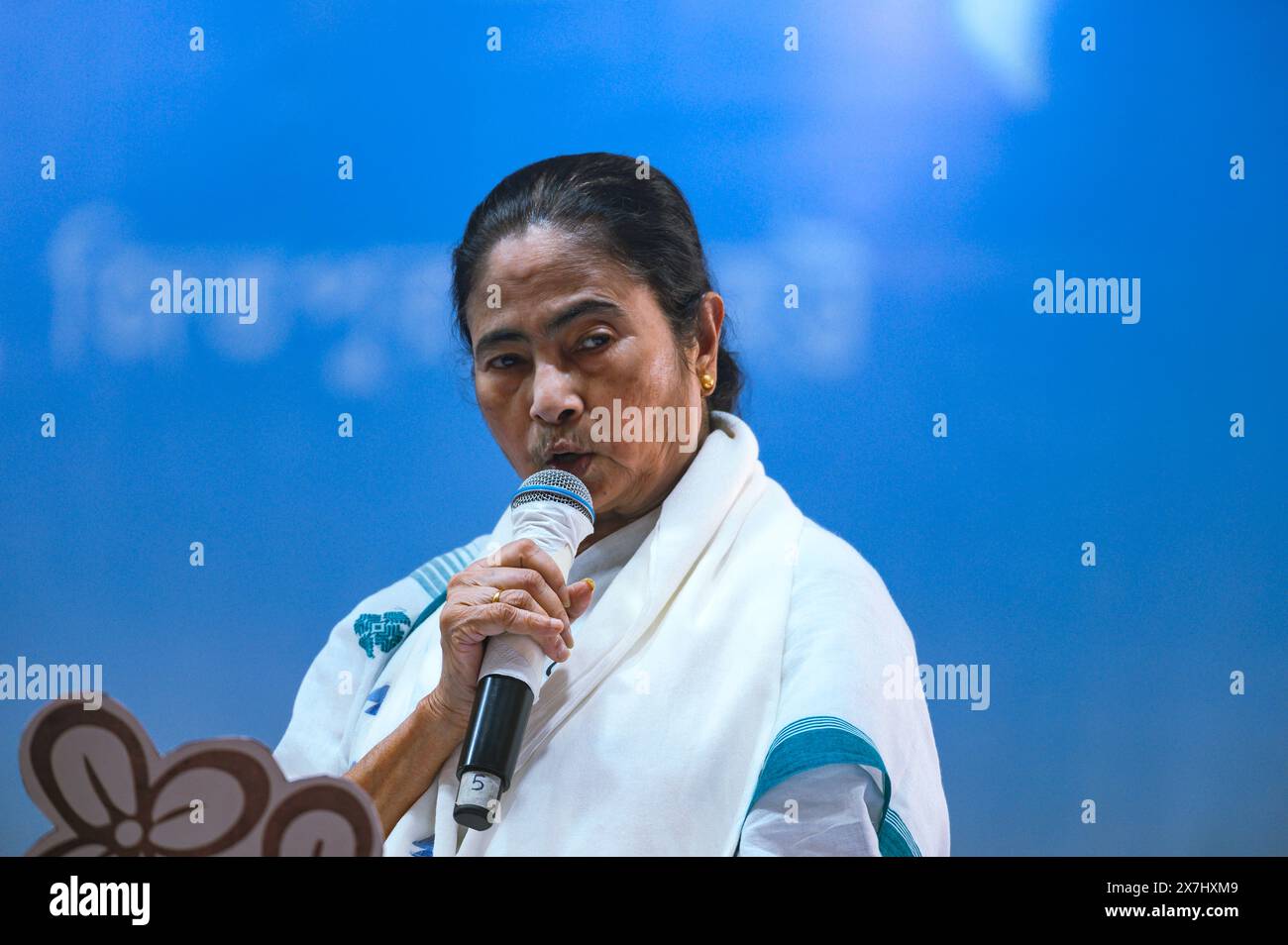 West Bengal's Chief Minister Mamata Banerjee, is the only female chief minister in India now. She is also the leader of the Trinamool Congress (TMC) party who served twice as Minister of Railways and multiple times as a Union Cabinet Minister. The CM is seen speaking at a public meeting during an election campaign rally in support of Indian MP Mahua Moitra at the Harichand Guruchand Stadium. Tehatta, West Bengal. India. Stock Photo