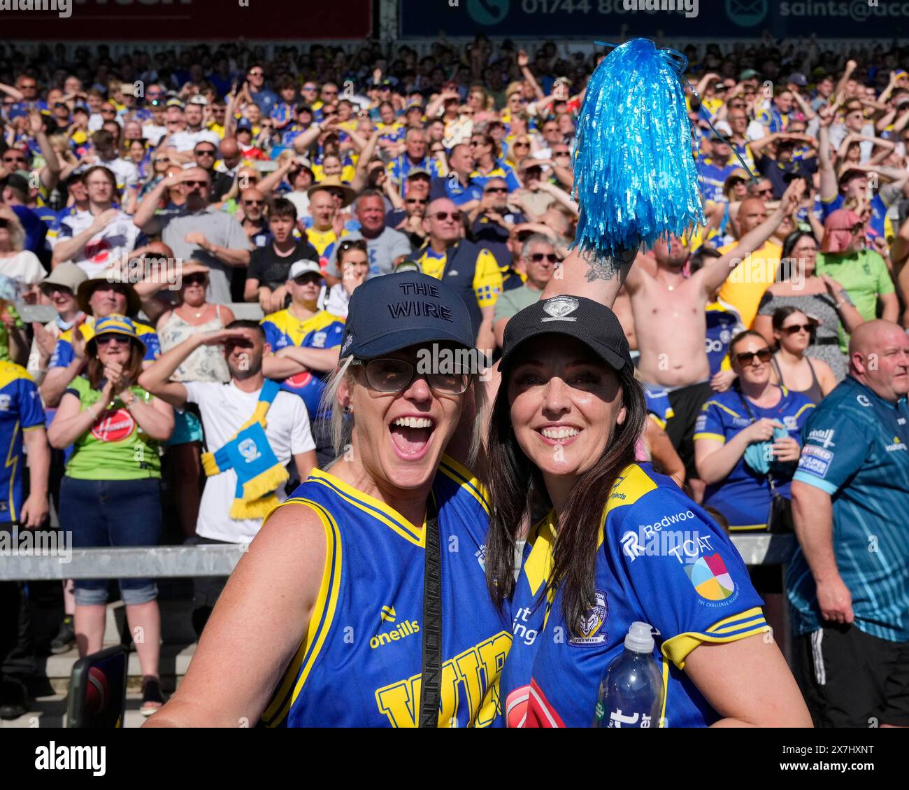 Warrington Wolves fans celebrate their win after the Betfred Challenge