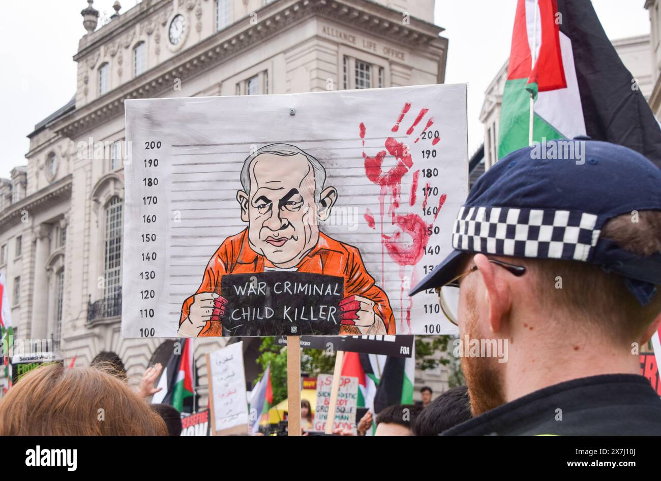 London, UK. 18th May 2024. Pro-Palestine protesters in Piccadilly Circus make their feelings known about Benjamin Netanyahu. Thousands of people marched in solidarity with Palestine on the 76th anniversary of the Nakba, as Israel continues its attacks on Gaza. Credit: Vuk Valcic/Alamy Live News Stock Photo