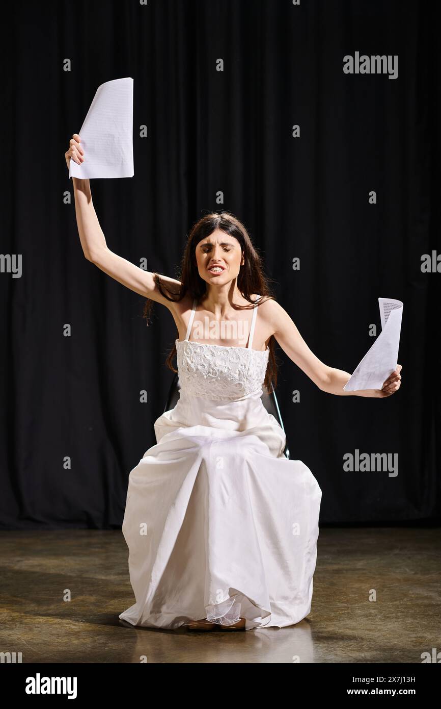 Woman in white dress holds hi-res stock photography and images - Alamy