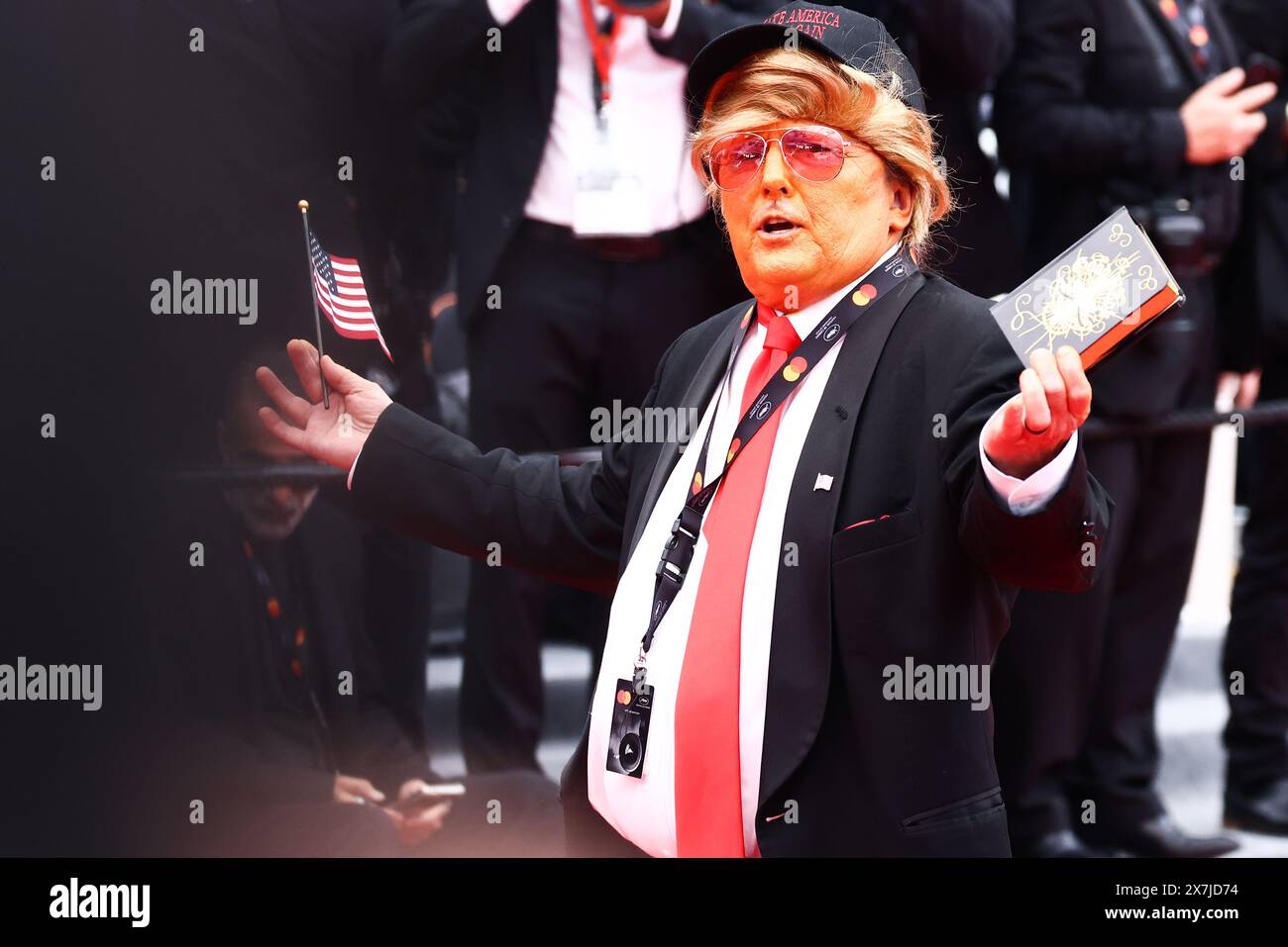 Cannes, France. 20th May, 2024. A man dressed as Donald Trump attends the ' The Apprentice ' Red Carpet during the 77th annual Cannes Film Festival at Palais des Festivals on May 20, 2024 in Cannes, France. (Photo by Beata Zawrzel/NurPhoto) Credit: NurPhoto SRL/Alamy Live News Stock Photo