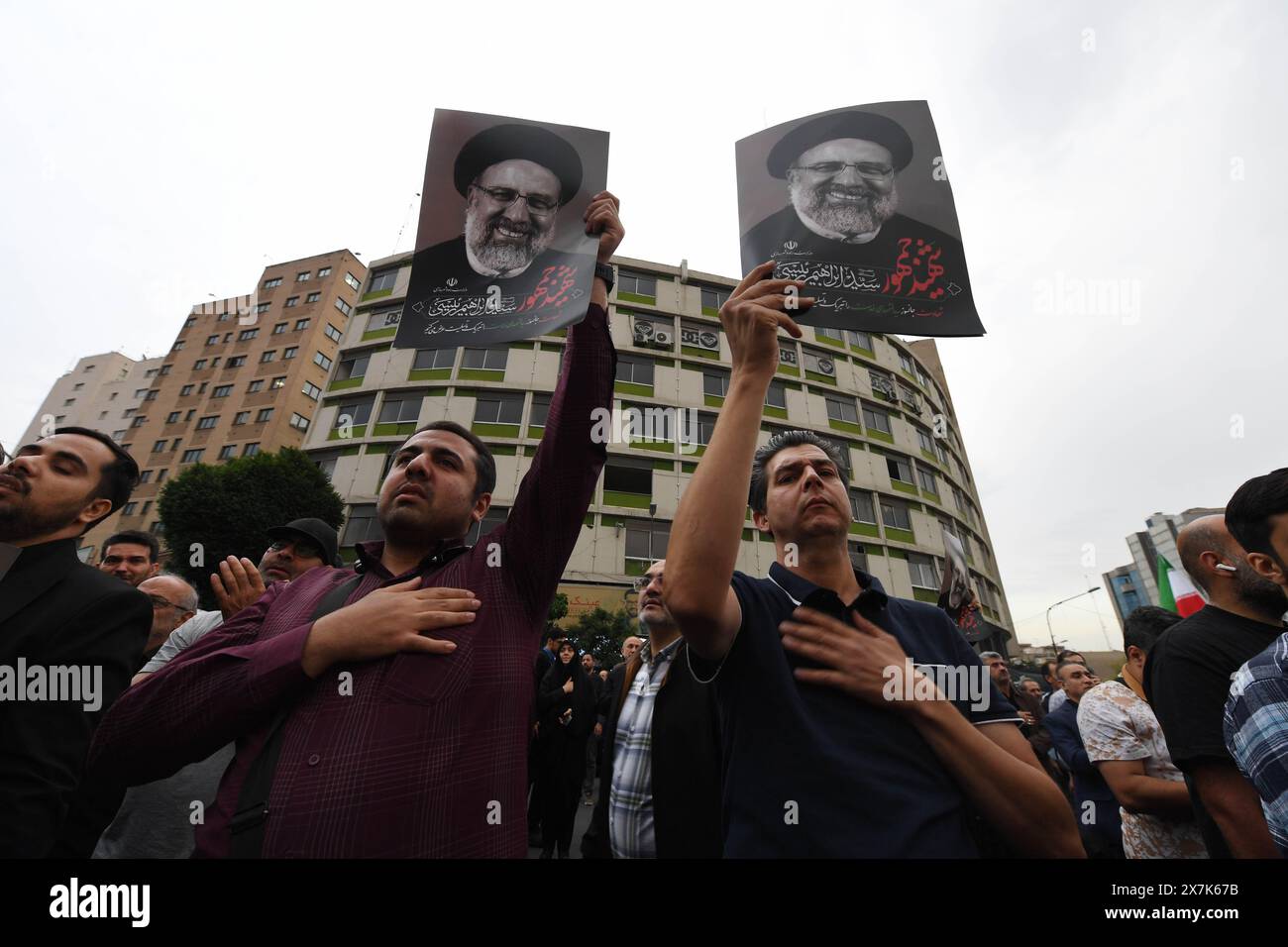 Tehran, Iran. 20th May, 2024. People mourn victims of the helicopter crash near Varzaqan County, in Tehran, Iran, on May 20, 2024. Iranian President Ebrahim Raisi and some members of his accompanying team, including Foreign Minister Hossein Amir-Abdollahian, were confirmed dead Monday morning as the wreckage of the helicopter carrying them was found following its crash in bad weather on Sunday near Varzaqan County. Credit: Xinhua/Alamy Live News Stock Photo