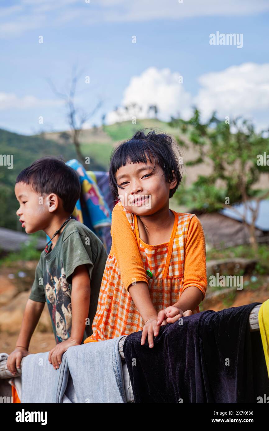 Young Lahu children, boy and girl, in a village near Lanjia Lodge in  Chiang Khong in Chiang Rai province, northern Thailand Stock Photo