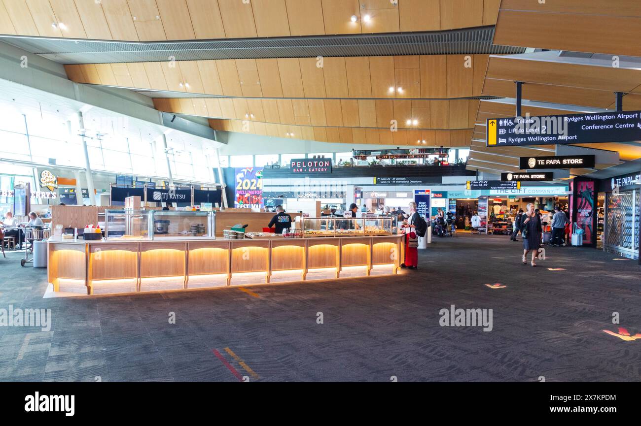 Wellington, New Zealand - February 21, 2024: Departure level shops and eateries at Wellington International Airport. Stock Photo
