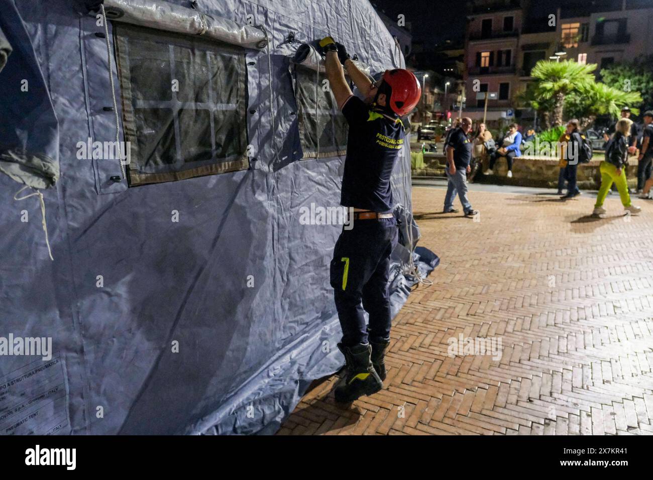 Italy: Campi Flegrei, bradisismo Campania s civil protection set up a tensile structure at the port of pozzuoli for people who are not confident about returning to their homes after the earthquake tremors, near Naples, southern Italy, 20 May 2024. The tremor that occurred at 8.10pm with epicentre in the Campi Flegrei was of magnitude 4.4. This was reported by the National Institute of Geophysics and Volcanology, according to which the depth of the quake was three kilometres. ABP01923 Copyright: xAntonioxBalascox Stock Photo