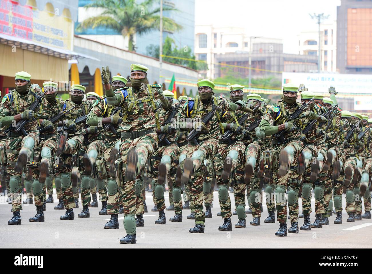 Yaounde, Cameroon. 20th May, 2024. Defense forces parade during the national day celebration in Yaounde, Cameroon, on May 20, 2024. Cameroon marked on Monday the 52nd anniversary of its National Day with military and civilian parades nationwide. In the capital Yaounde, Cameroonian President Paul Biya presided over the celebration that saw hundreds of soldiers and civilians march past in front of national and international dignitaries. Credit: Kepseu/Xinhua/Alamy Live News Stock Photo