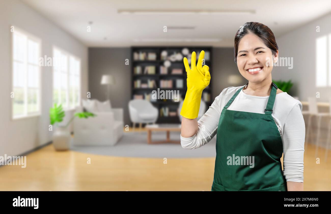 Woman in apron rubber gloves hi-res stock photography and images - Alamy