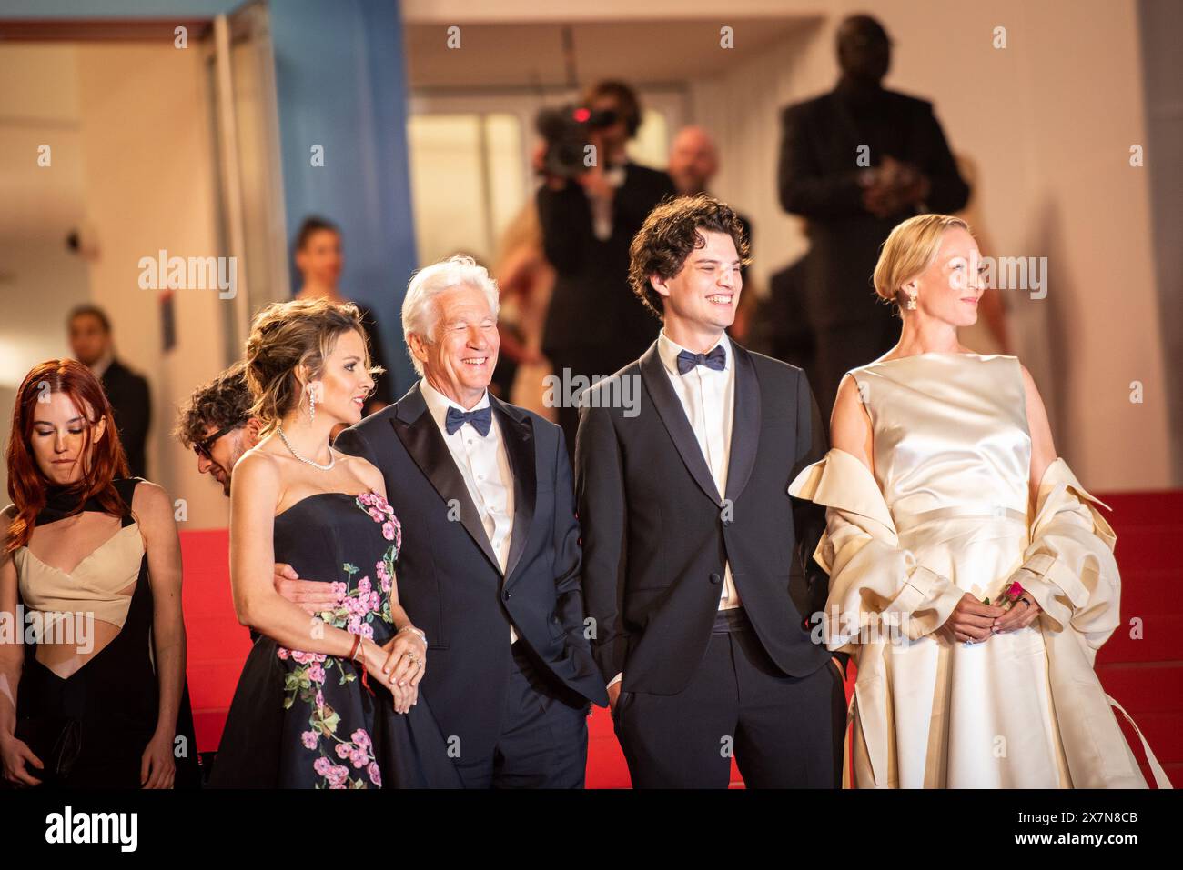 (L-R) Richard Gere, Allejandra Silva, Homer James Jigme Gere and Uma Thurman attend the 'Oh, Canada' Red Carpet at the 77th annual Cannes Film Festival at Palais des Festivals. Stock Photo