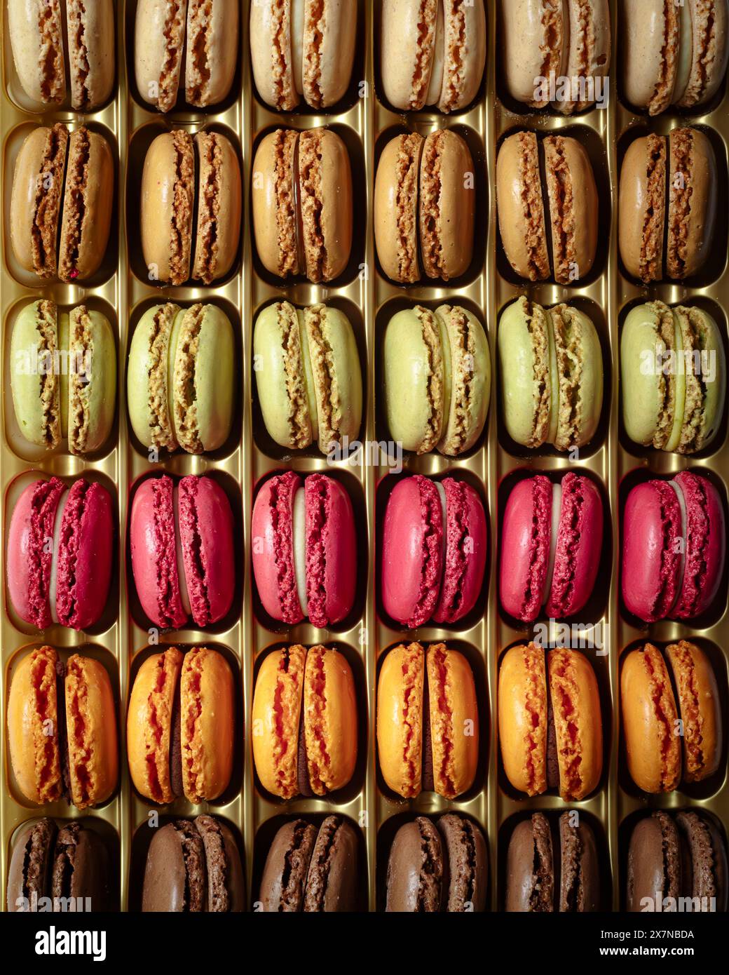 Rows of colourful macarons in packaging Stock Photo