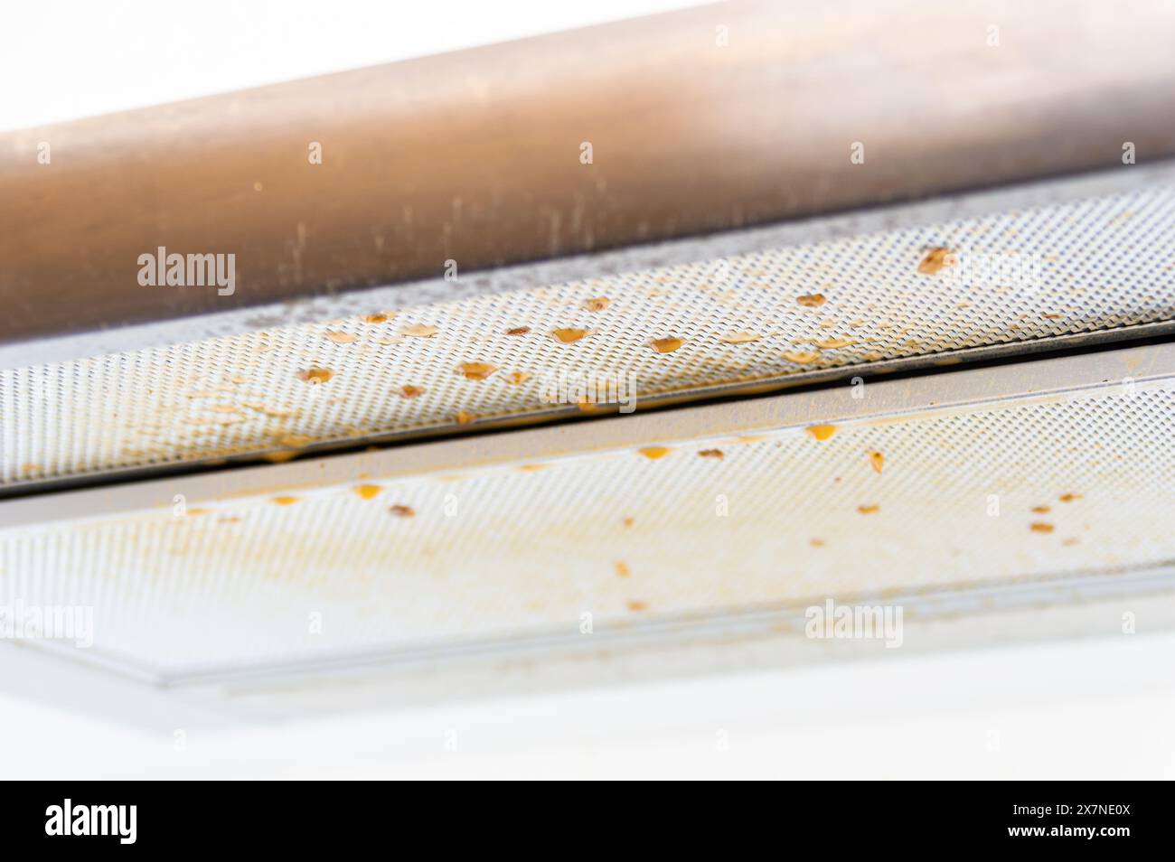 dirty metal kitchen hood cooker full of sticky cooking oil needed to be