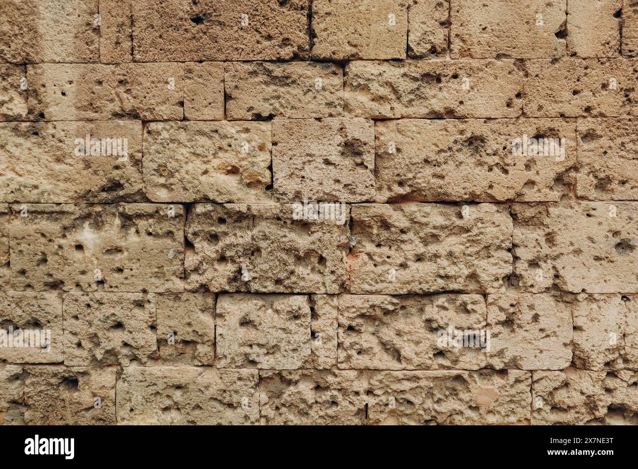 A wall in Beirut that bears traces of shots and explosions during the civil war Stock Photo