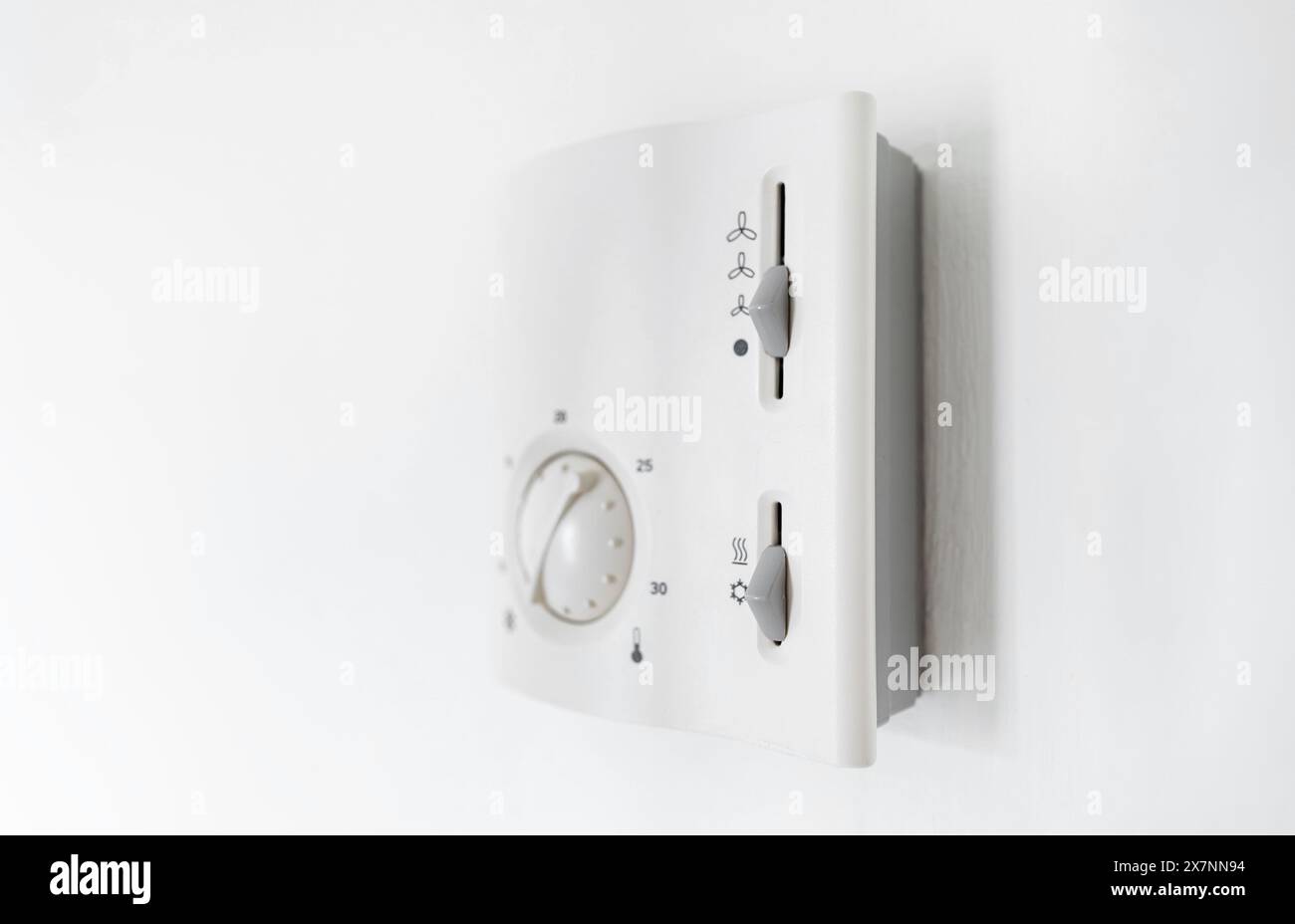 Control panel for built-in air conditioners on the wall. Stock Photo